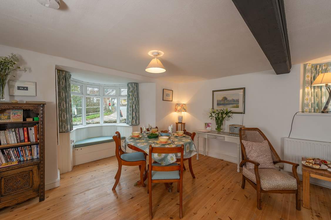 The window seat is another lovely feature in this welcoming cottage