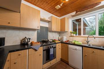 The kitchen is the first room that you enter - though there is a second door -with a very useful porch - into the living room