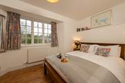 This is the master bedroom.  There is a lovely view over the river to the nature reserve on the other side, and up the hill ito the heart of the historic village