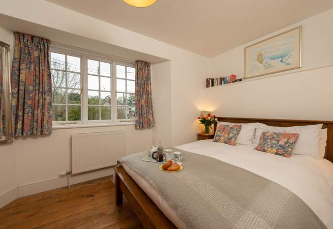 This is the master bedroom.  There is a lovely view over the river to the nature reserve on the other side, and up the hill ito the heart of the historic village