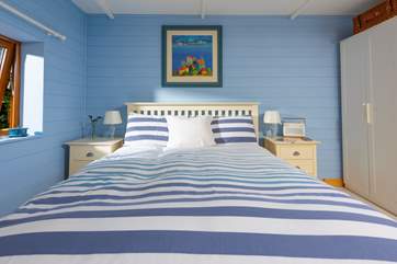 The king-size bed provides the perfect place to rest your head.