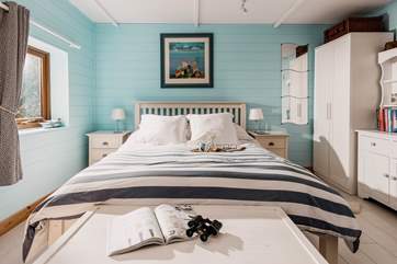 The sumptuous king size bed is perfect for leisurely lie-ins.