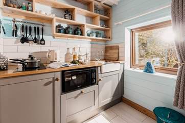 The kitchen area is a lovely space to rustle up delicious meals.