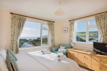 The dual-aspect master bedroom has wonderful sea views and is flooded with light.