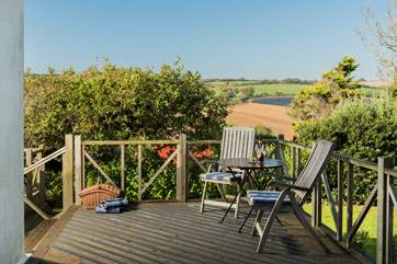 Take a seat on the upper decking outside the kitchen and not only do you get fab views but you are close enough to the fridge to top up your drink!