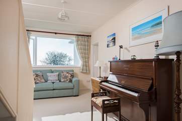 Relax in the hallway whilst tickling the ivories before breakfast.