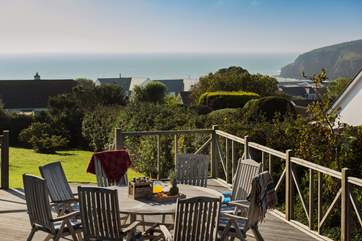 The spacious decking is the perfect spot for dining and relaxing after a day on the beach, fire up the barbecue and enjoy!