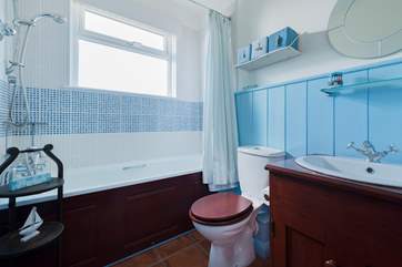 The family bathroom with bath and shower.