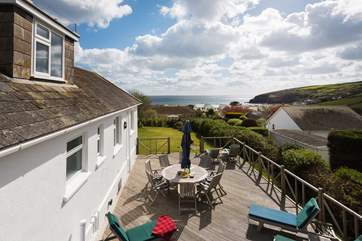 A birds-eye view from the decking down to the sea beyond.
