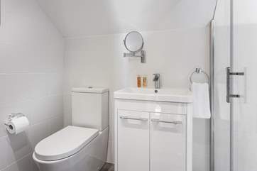 The crisp white, modern shower-room.