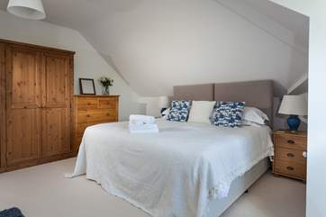 The welcoming and comfortable bedroom.