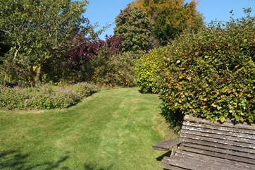 The garden offers several lovely seating areas where you can enjoy the views and the peace.