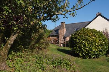 Another view of the annexe - the left-hand part of this image, with the wonderful chimney stack for its wood-burning stove.