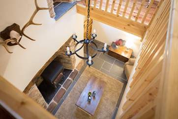 Having this mezzanine level means that the wonderful warmth of the wood-burning stove fills the cottage.