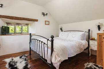 The pretty bedroom is the perfect spot for breakfast in bed.