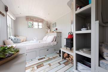 The king-size double bed is positioned at one end.