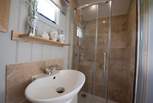The en suite shower-room is beautifully fitted.