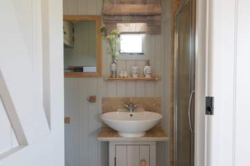 In true luxury glamping style, there is hot running water, shower and proper flushing loo.