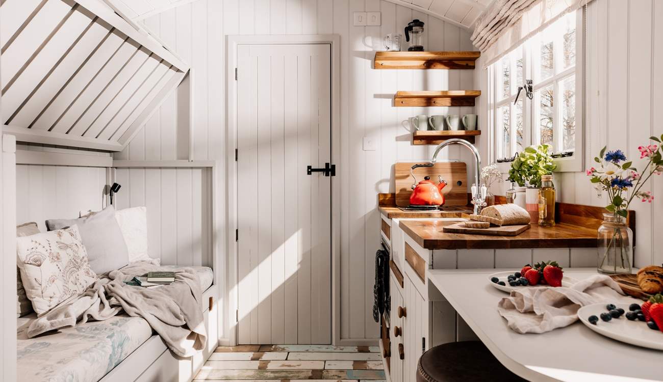 The top bunk-bed folds up, creating extra living space during the day. 