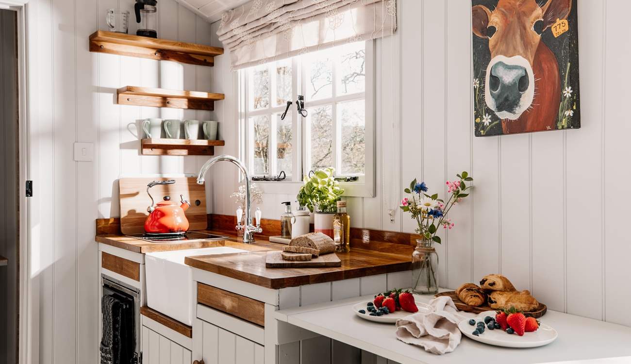 The super sweet kitchen area, complete with everything you'll need during your stay. 
