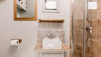 The shower-room is beautifully presented, perfect for freshening up after a countryside ramble. 