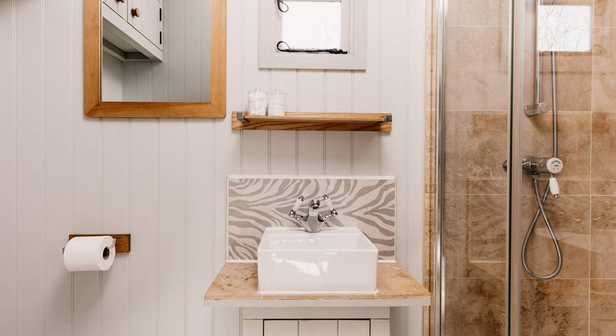 The shower-room is beautifully presented, perfect for freshening up after a countryside ramble. 