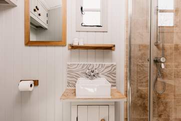 The shower-room is beautifully presented, perfect for freshening up after a countryside ramble.