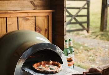 Whip up some delicious pizzas and then dine al fresco!