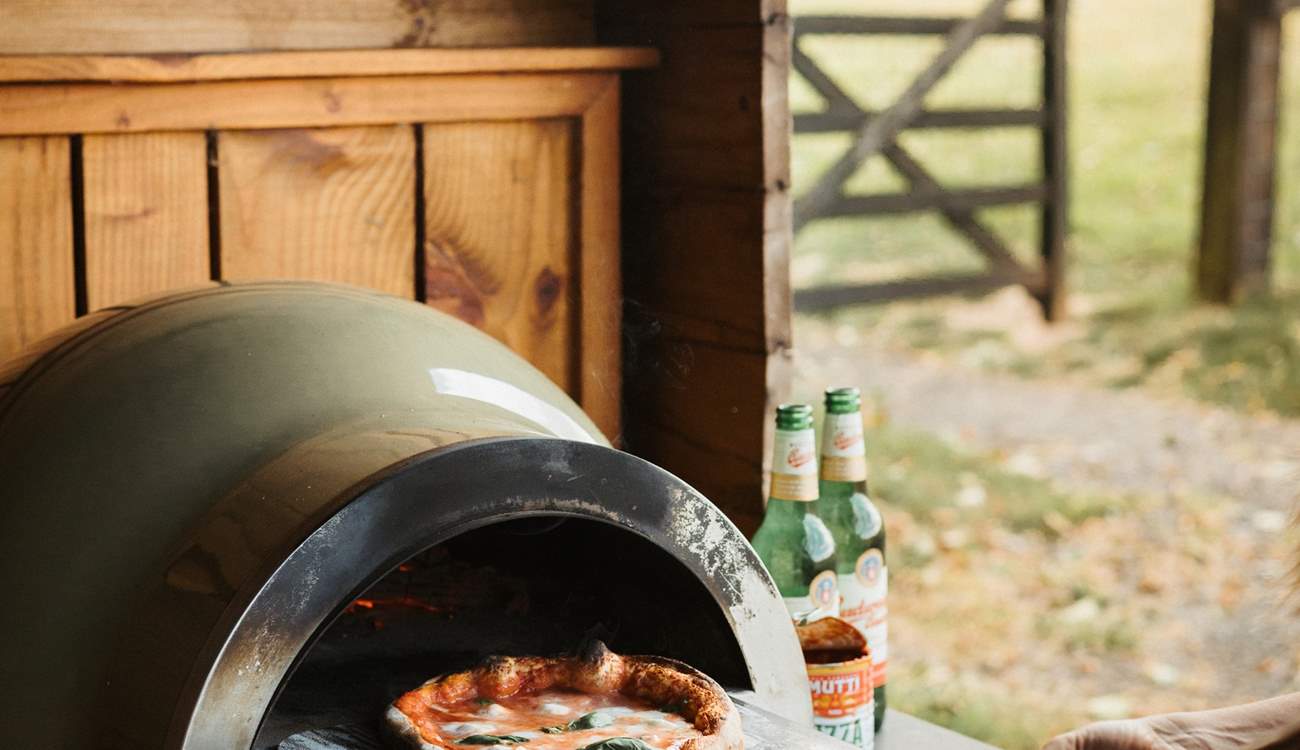 Whip up some delicious pizzas and then dine al fresco!