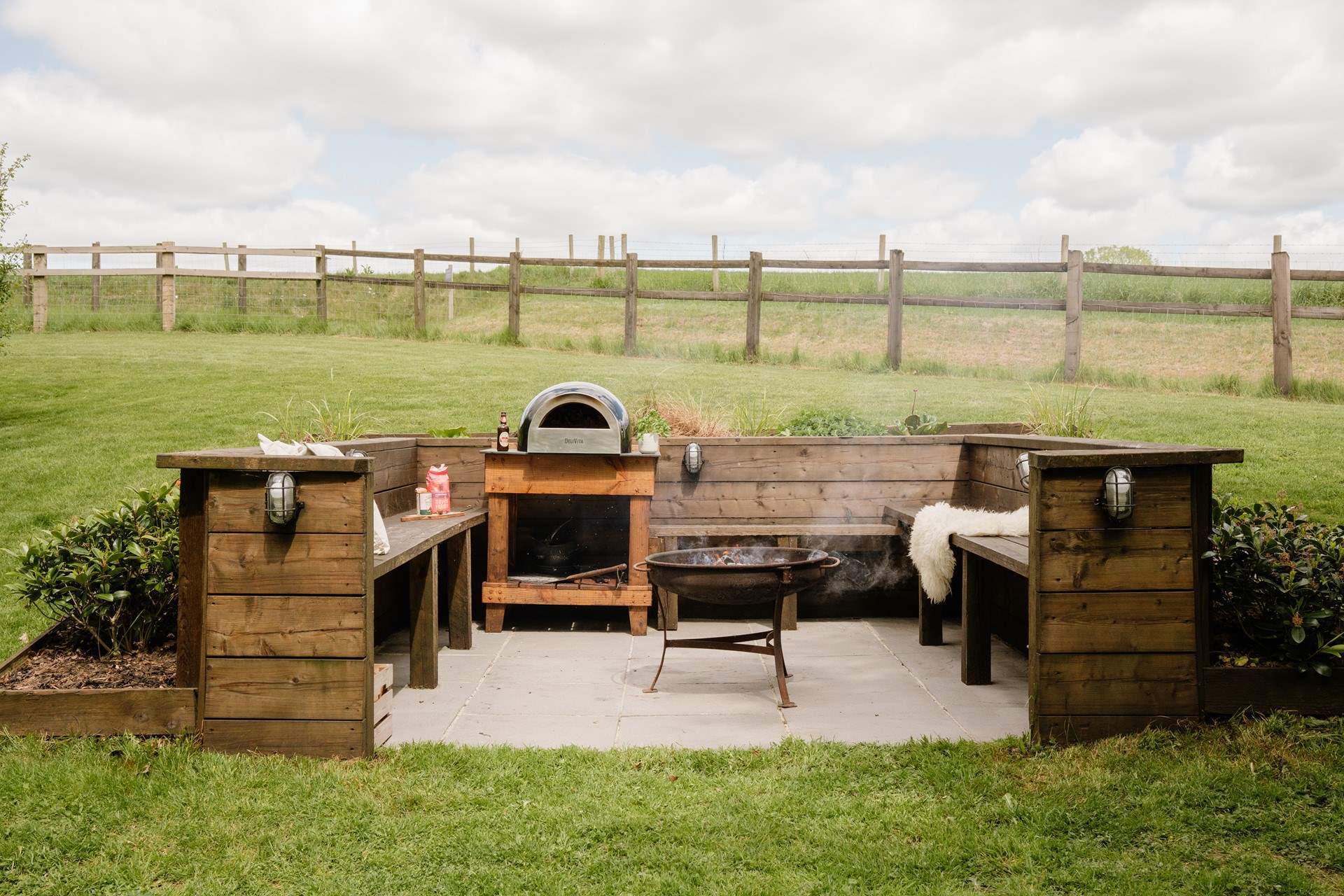 The snug fire-pit and pizza oven area is a magical feature.