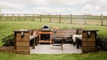 The snug fire-pit and pizza oven area is a magical feature.