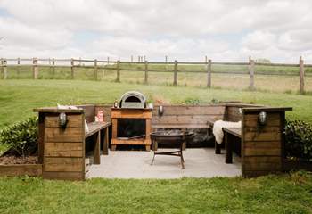 The snug fire-pit and pizza oven area is a magical feature.