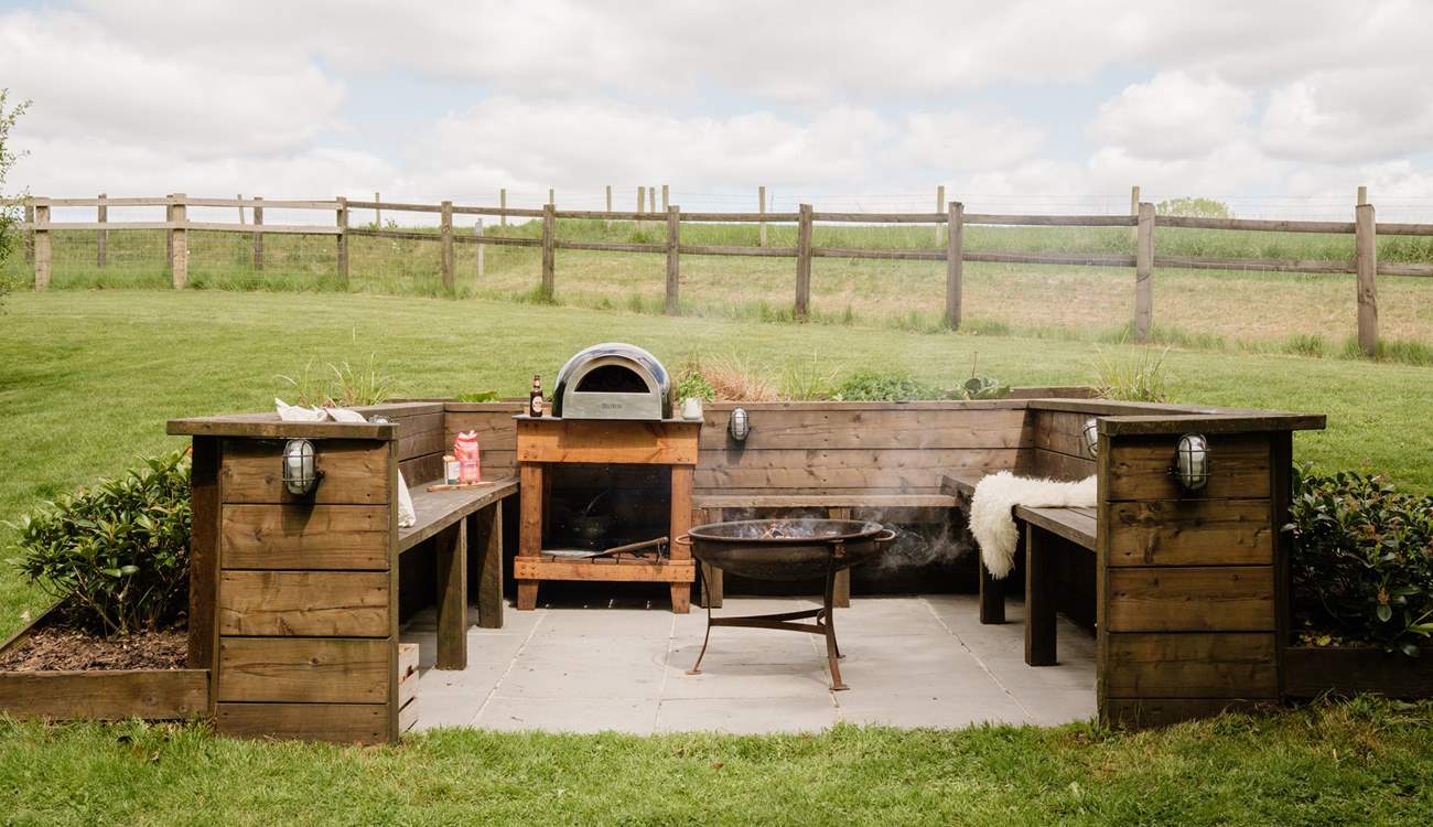 The snug fire-pit and pizza oven area is a magical feature.