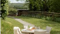 Whip up some delicious pizzas and then dine al fresco!