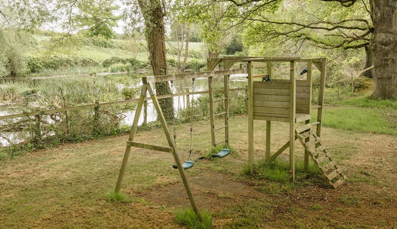 A short walk away, children can enjoy the swings by the lake. (Please note this area is shared with the other hideaway on site. 