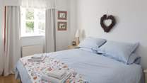 The bedroom has a super-comfy 'zip and link' (super-king or twin) bed and lovely linens.