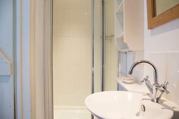 The shower-room has a large cubicle and heated towel rail for warm towels.