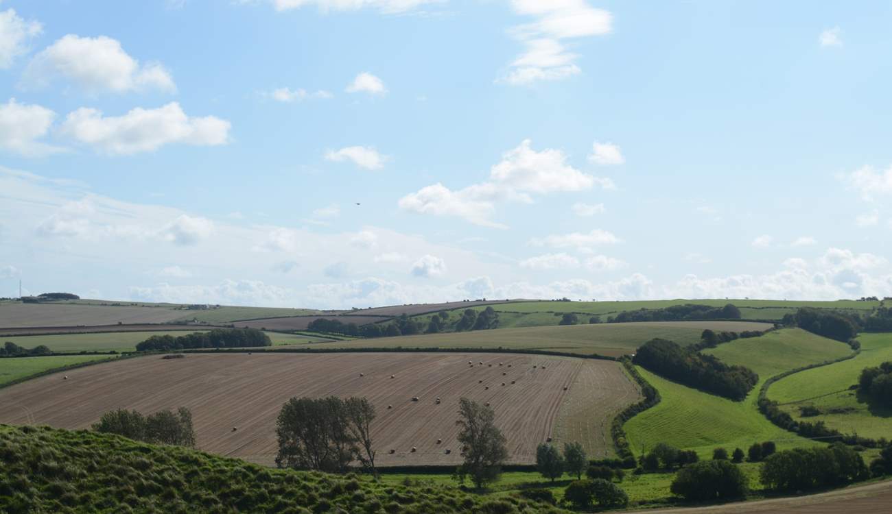 Rural Dorset from Maiden Castle, just outside of Dorchester, one of the largest Iron Age hill forts in Europe.