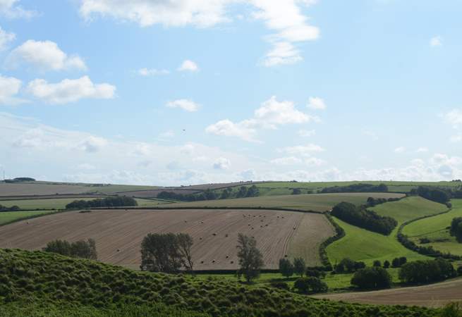 Rural Dorset from Maiden Castle, just outside of Dorchester, one of the largest Iron Age hill forts in Europe.