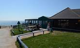 The Hive Beach cafe at Burton Bradstock, right on the Jurassic Coast serves delicious local seafood and homemade cakes. - Thumbnail Image