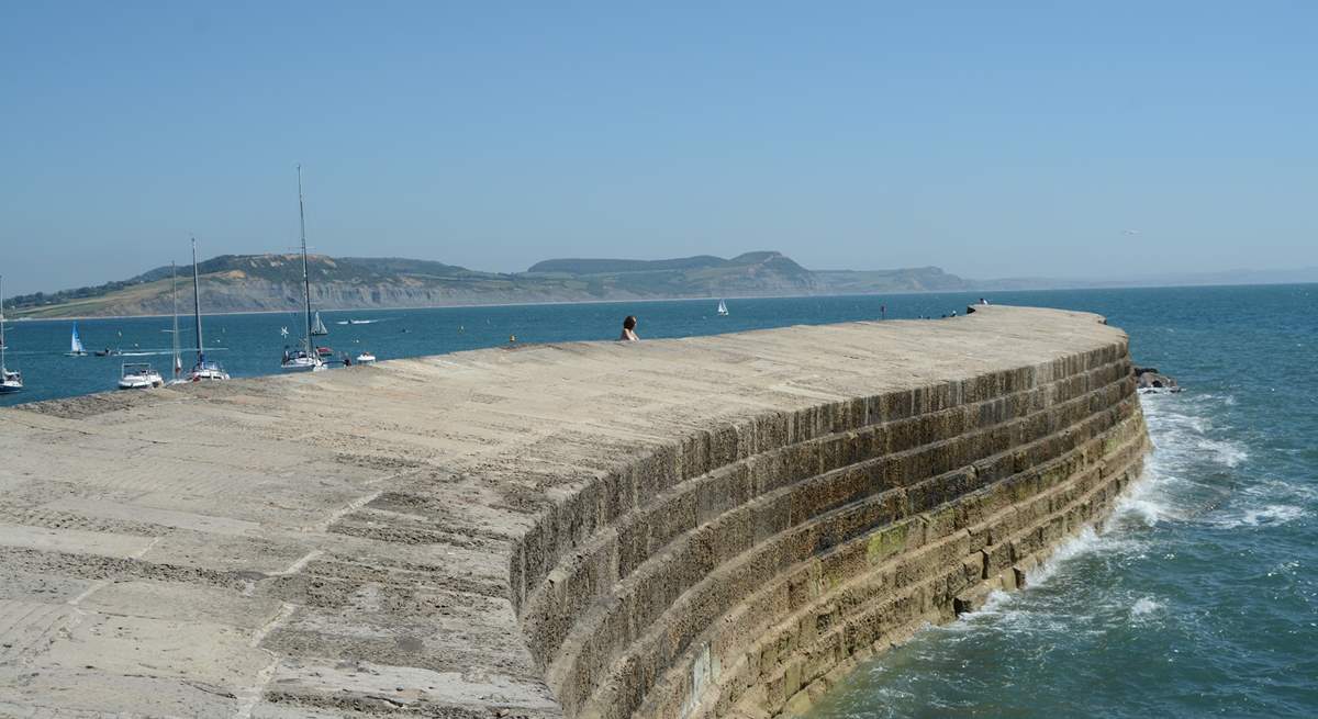 The iconic Cobb at Lyme Regis with Golden Cap in the background.