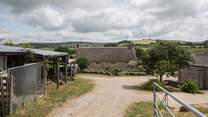 This delighful farmyard has far-reaching views, the helpful owners live in the farmhouse in the middle  of the photo.