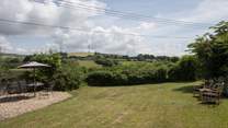 The mature garden, a perfect place to relax and enjoy the country air, maybe even a snooze.