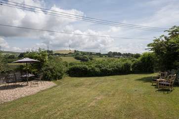 The mature garden, a perfect place to relax and enjoy the country air, maybe even a snooze.