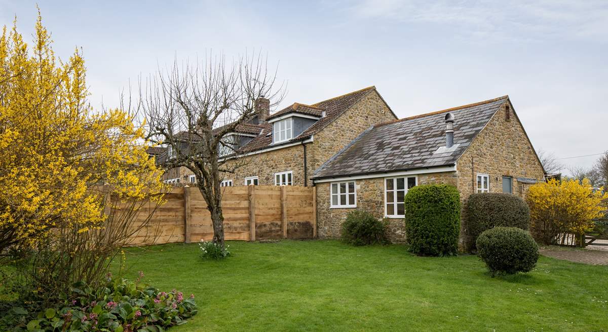 The new fence between the two cottages adds to the seculsion in this beautiful setting.