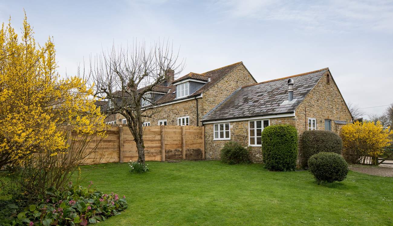 The new fence between the two cottages adds to the seculsion in this beautiful setting.