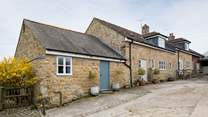 Badgers Cottage is next door to Barn Owls Cottage, Badgers is in the foreground.