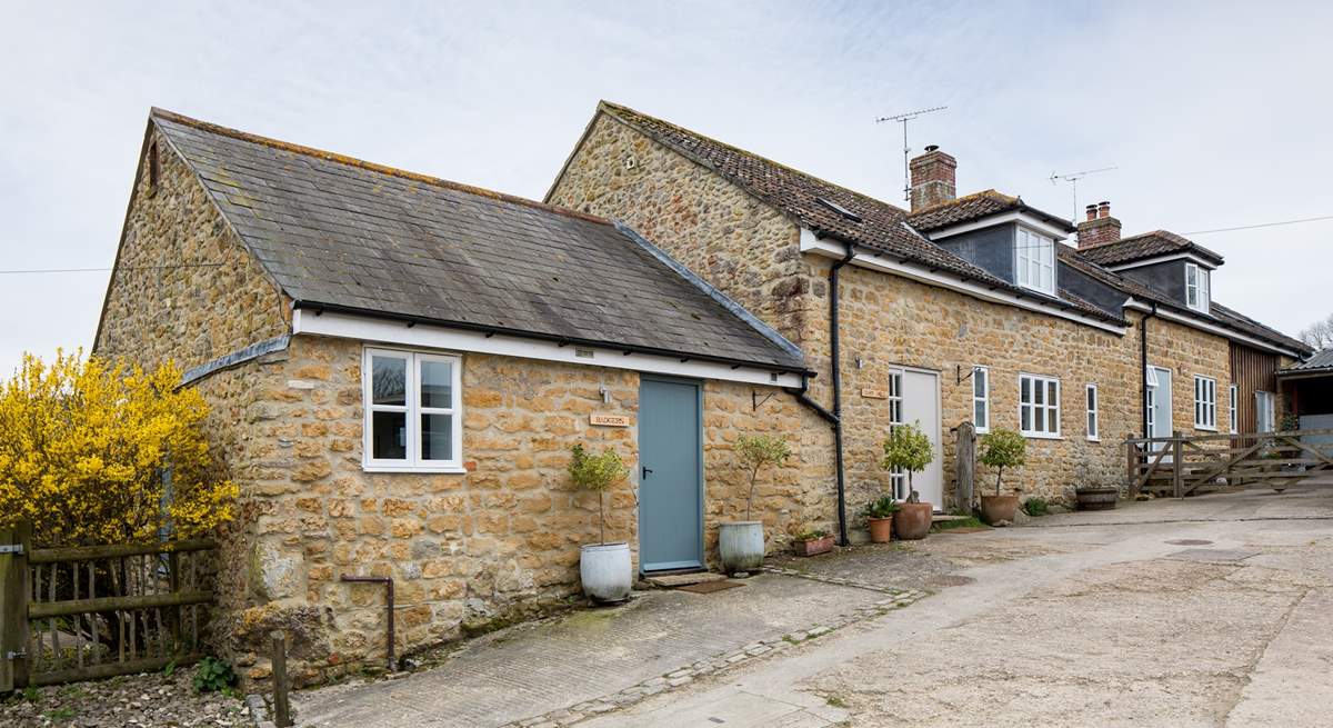 Badgers cottage is next door to Barn Owls cottage, Badgers is in the foreground.