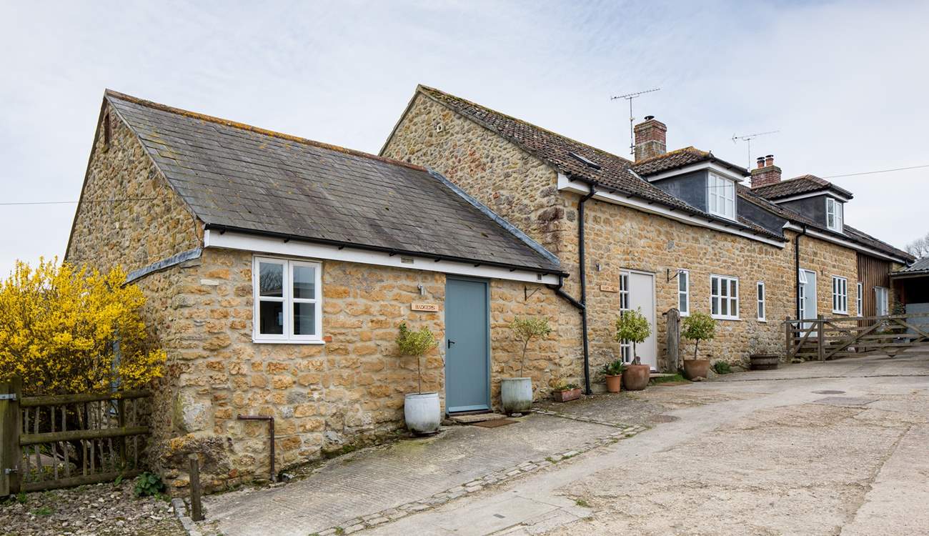 Badgers cottage is next door to Barn Owls cottage, Badgers is in the foreground.