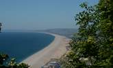 Chesil beach, taken from the Isle of Portland looking back along the Jurassic Coast towards Lyme Regis in the far distance. - Thumbnail Image